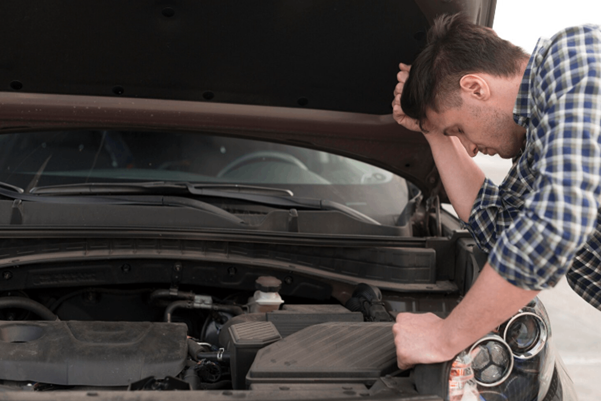 A man hearing car noises after an accident